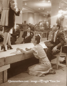 Neiman-Marcus---1945--Stanley-Marcus-observes-catwalk-model