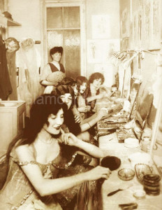 Paris chorus girls apply makeup in 1913