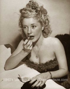 Sweetheart's-dance-beauty-contest-1944---girl-puts-on-lipstick