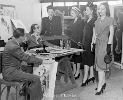 Dorothy Shaver ( standing) discusses virtues and flaws of girls applying as models