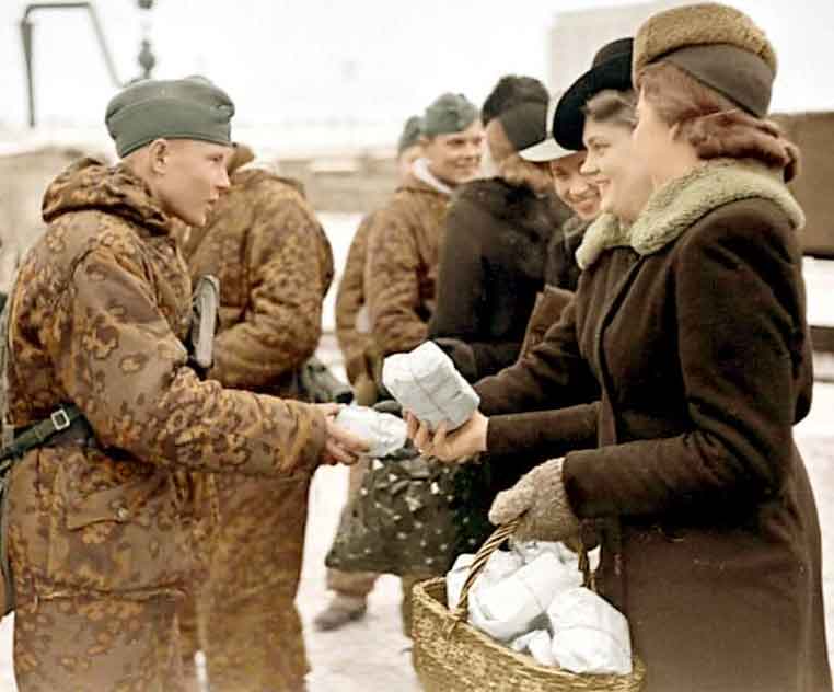 group-of-german-women-passing-out-food-parcels-ww11