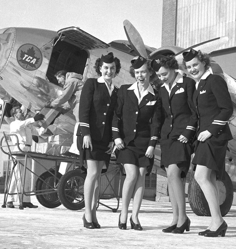 a-group-of-air-hostesses-show-off-their-nylons-in-1946---Air-Canada-Archives