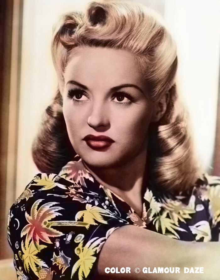 Image of Pin-up victory rolls 1940s hairstyle