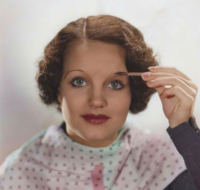 Dünne Augenbrauen im Stil der 1930er Jahre